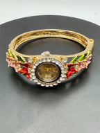 Enamel flower cuff watch with floral design and rhinestone accents, featuring a stylish Republic Mercantile timepiece.