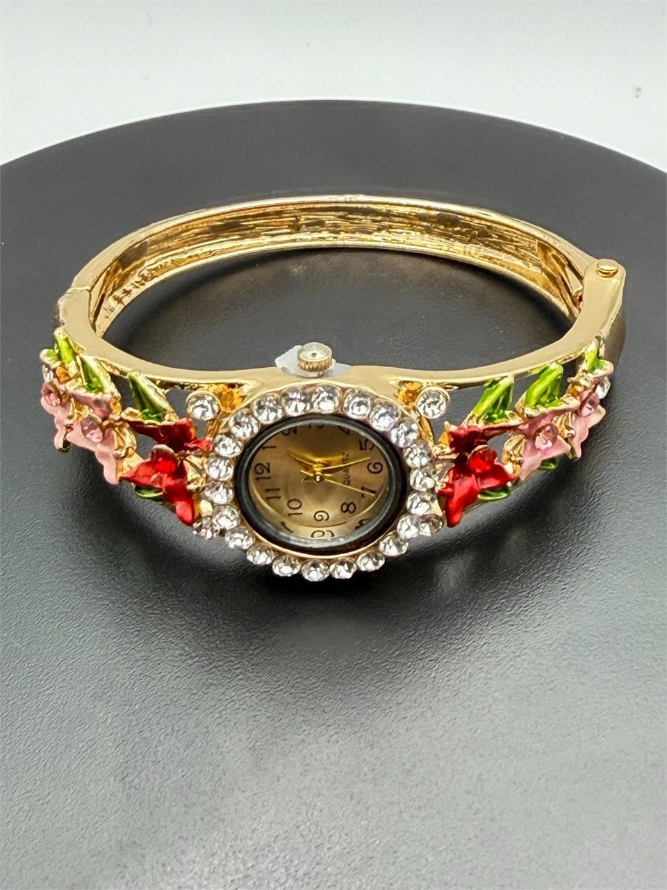 Enamel flower cuff watch with floral design and rhinestone accents, featuring a stylish Republic Mercantile timepiece.