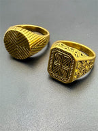 Pair of men's gold tone rings in size 9 from Republic Mercantile, featuring smooth polished finish and classic design.