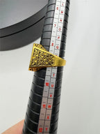 Pair of men's gold tone rings in size 9 from Republic Mercantile, showcasing sleek, polished jewelry design.