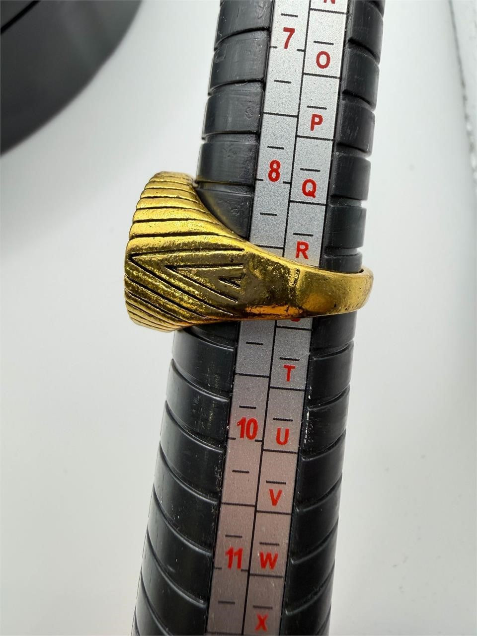 Pair of men's gold tone rings in size 9, stylish jewelry by Republic Mercantile, shown on a plain background.