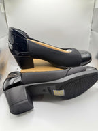 Dream Pairs chunky black pumps with a high heel, size 8.5, featuring a sleek design and stylish silhouette.
