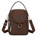 Women's single shoulder bag with multiple pockets and zippers by Jingpin, featuring a stylish design and functional storage.