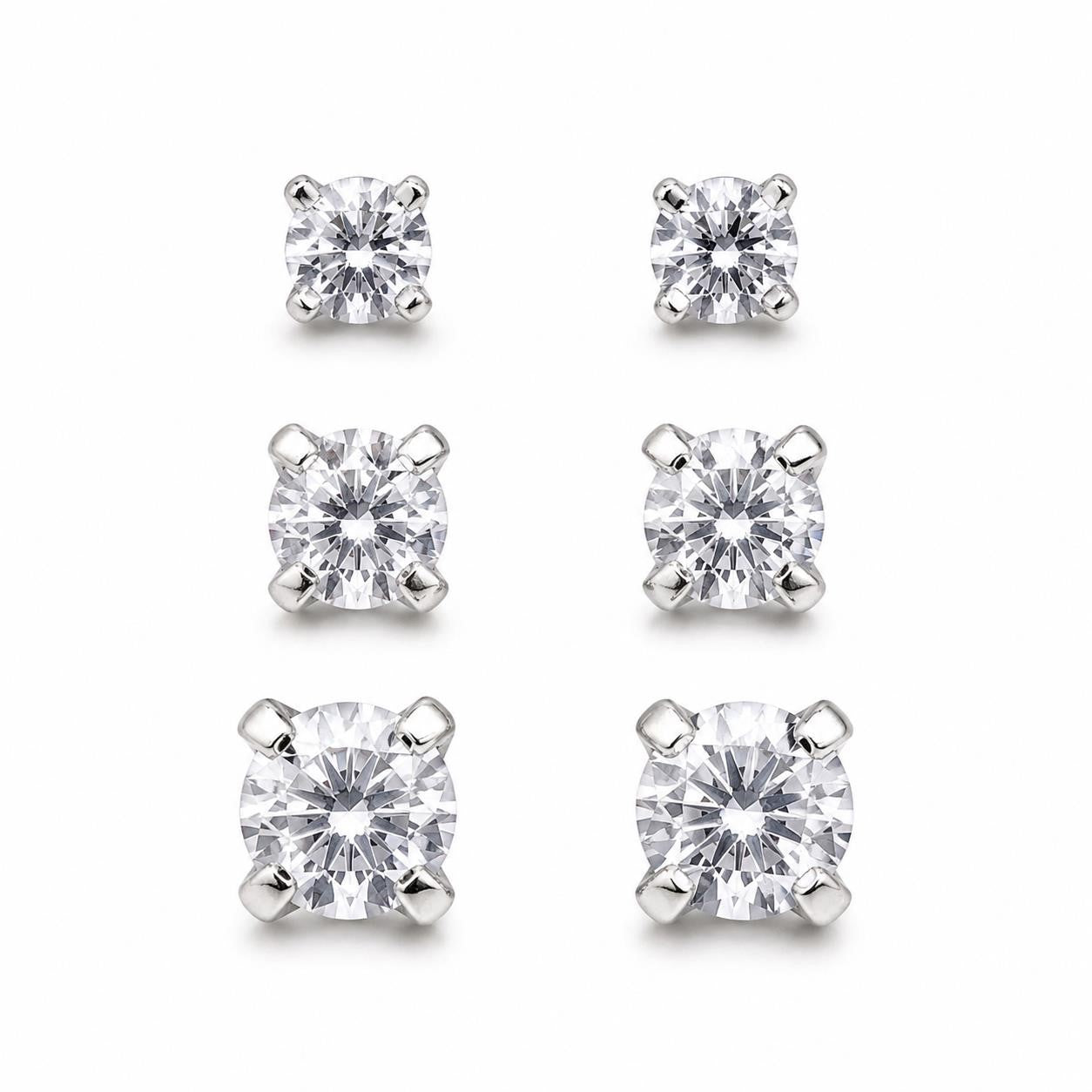 Three pairs of crystal clear gem earrings in small, medium, and large sizes, featuring sparkling gemstone designs by Republic Mercantile