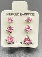 Three pairs of pink crystal gem earrings in small, medium, and large sizes from Republic Mercantile displayed on a plain background.