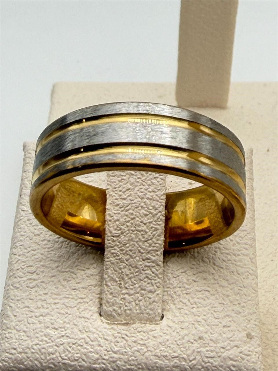 Men's gold and silver toned ring in size 11.5, featuring a sleek, polished design from Republic Mercantile.