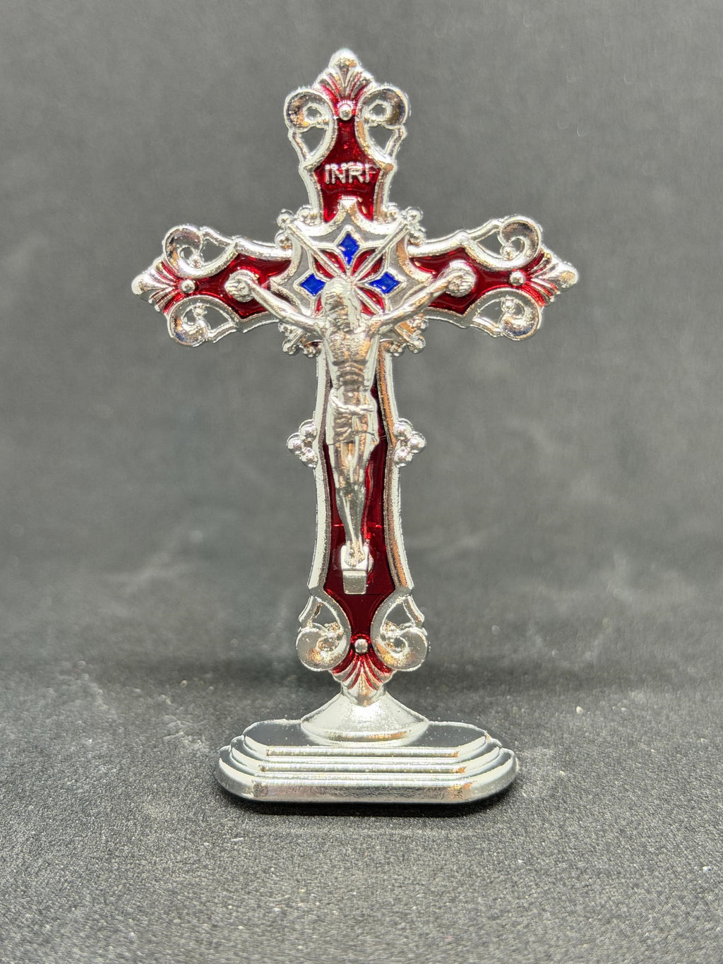 Red and silver cross statue, 3 inches tall, with intricate design, crafted by Republic Mercantile, displayed on a neutral background.