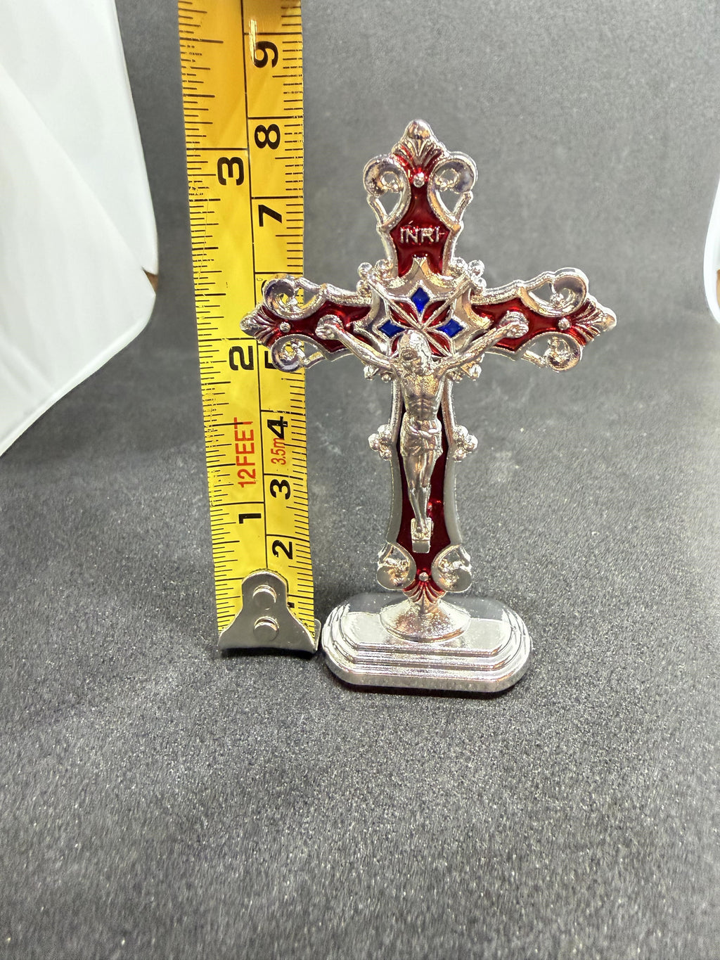 Red and silver cross statue, 3 inches tall, crafted by Republic Mercantile, featuring detailed design and vibrant color accents.