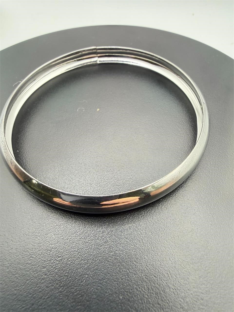 Simple and lightweight silvery bangle bracelet from Republic Mercantile, featuring a sleek, minimalist design.