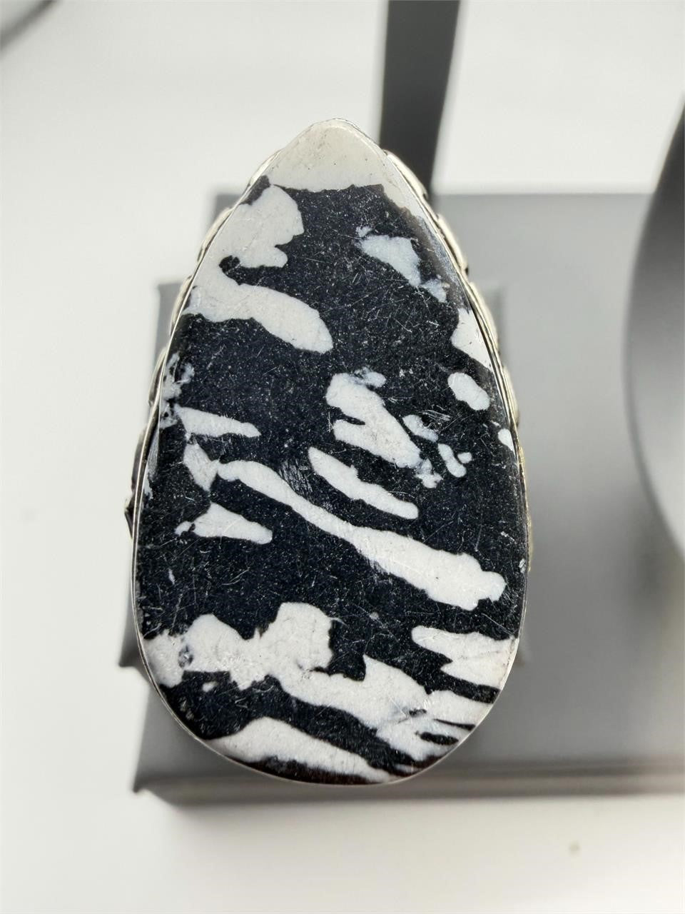 Sterling silver women's ring with zebra jasper stone in size 8.5, featuring a sleek, polished band and unique patterned gemstone.