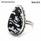 Sterling silver women's ring with zebra jasper stone, size 8.5, featuring a polished band and unique natural stone pattern.