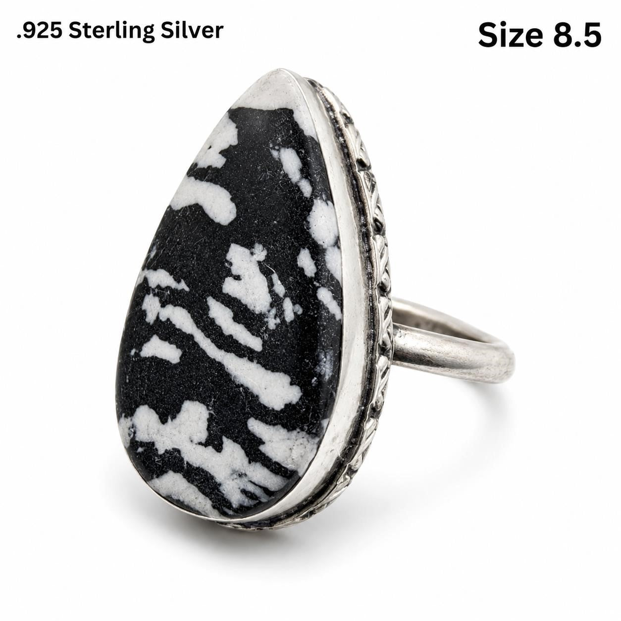Sterling silver women's ring with zebra jasper stone, size 8.5, featuring a polished band and unique natural stone pattern.