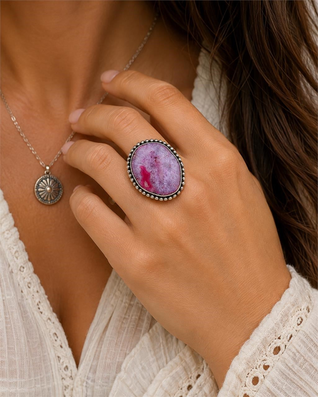 Sterling silver women's ring with pink dyed agate stone, size 8, featuring a polished and elegant design.
