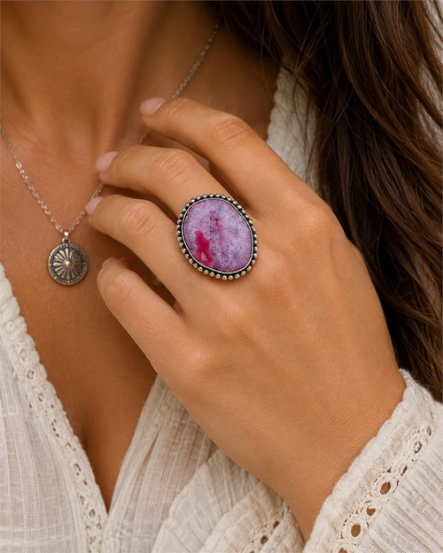 Sterling silver women's ring with pink dyed agate stone, size 8, featuring a polished and elegant design.