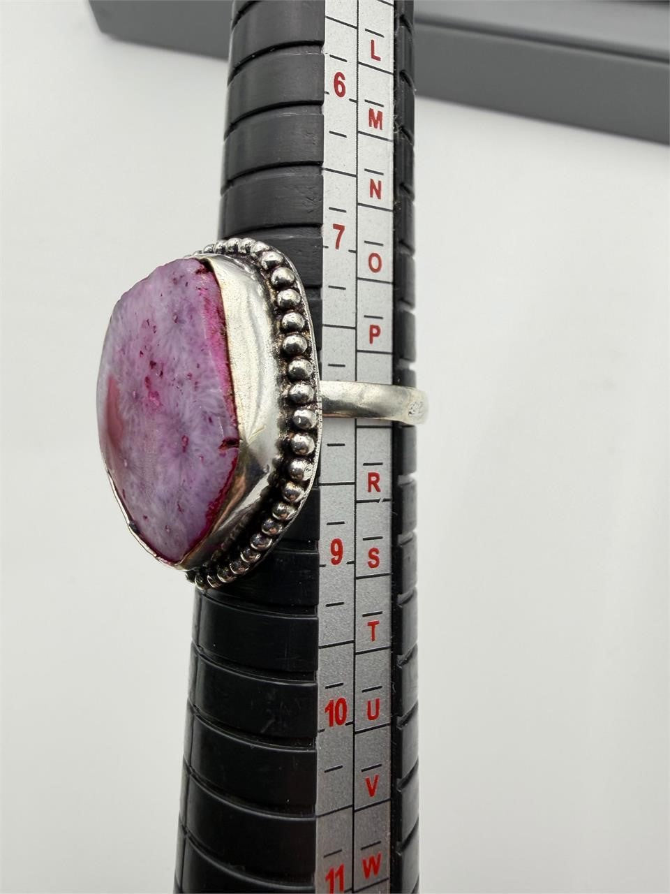 Sterling silver women's ring with pink dyed agate stone, size 8, from Republic Mercantile, showcasing a polished gemstone and silver band.
