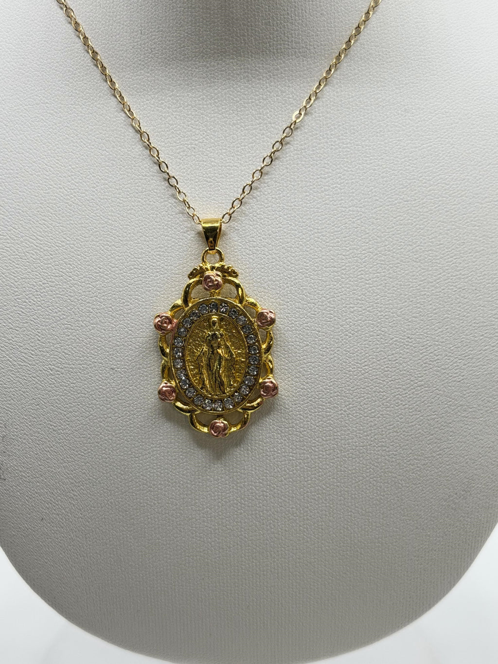 Mother Mary pendant necklace with rose accent, featuring a detailed religious charm on a silver chain by Republic Mercantile.