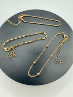 Set of 3 gold tone chain bracelets from Republic Mercantile, featuring layered metallic chain designs for a stylish look