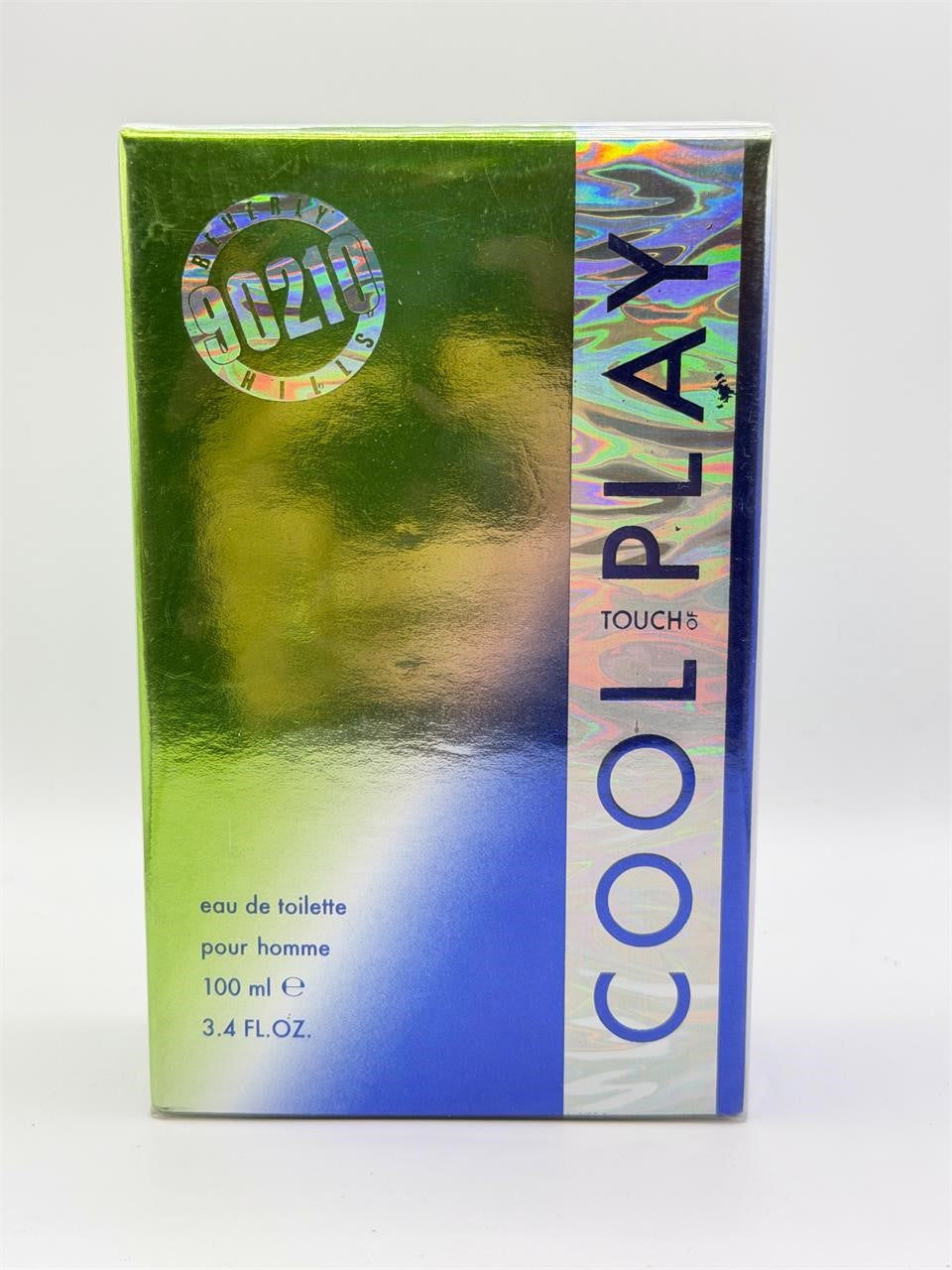 90210 Cool Play men's fragrance bottle with 3.4 fl oz size, showcasing sleek design and branding.