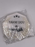A 2.5-inch clear acrylic award with "You Make a Difference" engraved, awarded by Republic Mercantile, displayed on a wooden surface.