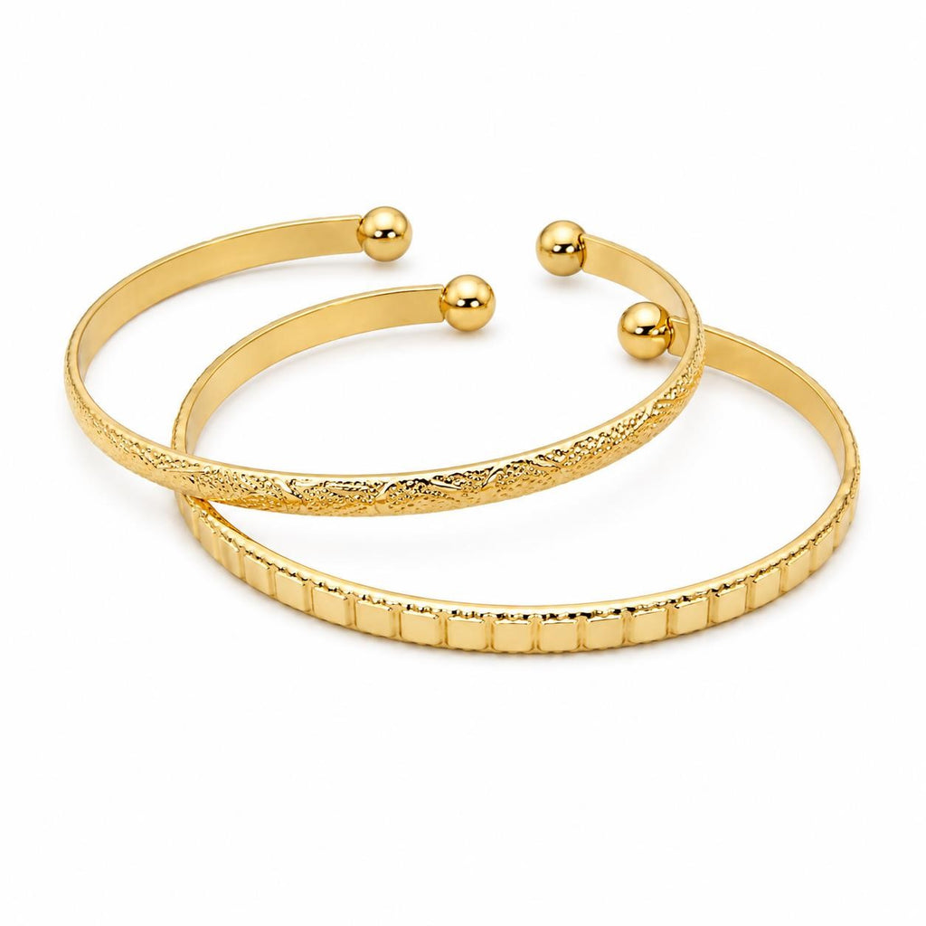 Two gold tone bangle bracelets from Republic Mercantile, featuring sleek and polished jewelry design for stylish accessories.