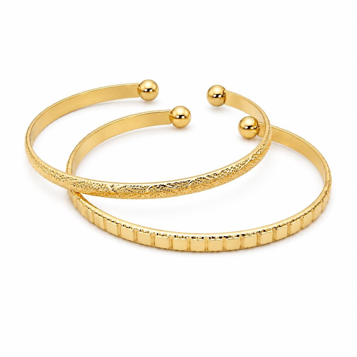 Two gold tone bangle bracelets from Republic Mercantile, featuring sleek and polished jewelry design for stylish accessories.