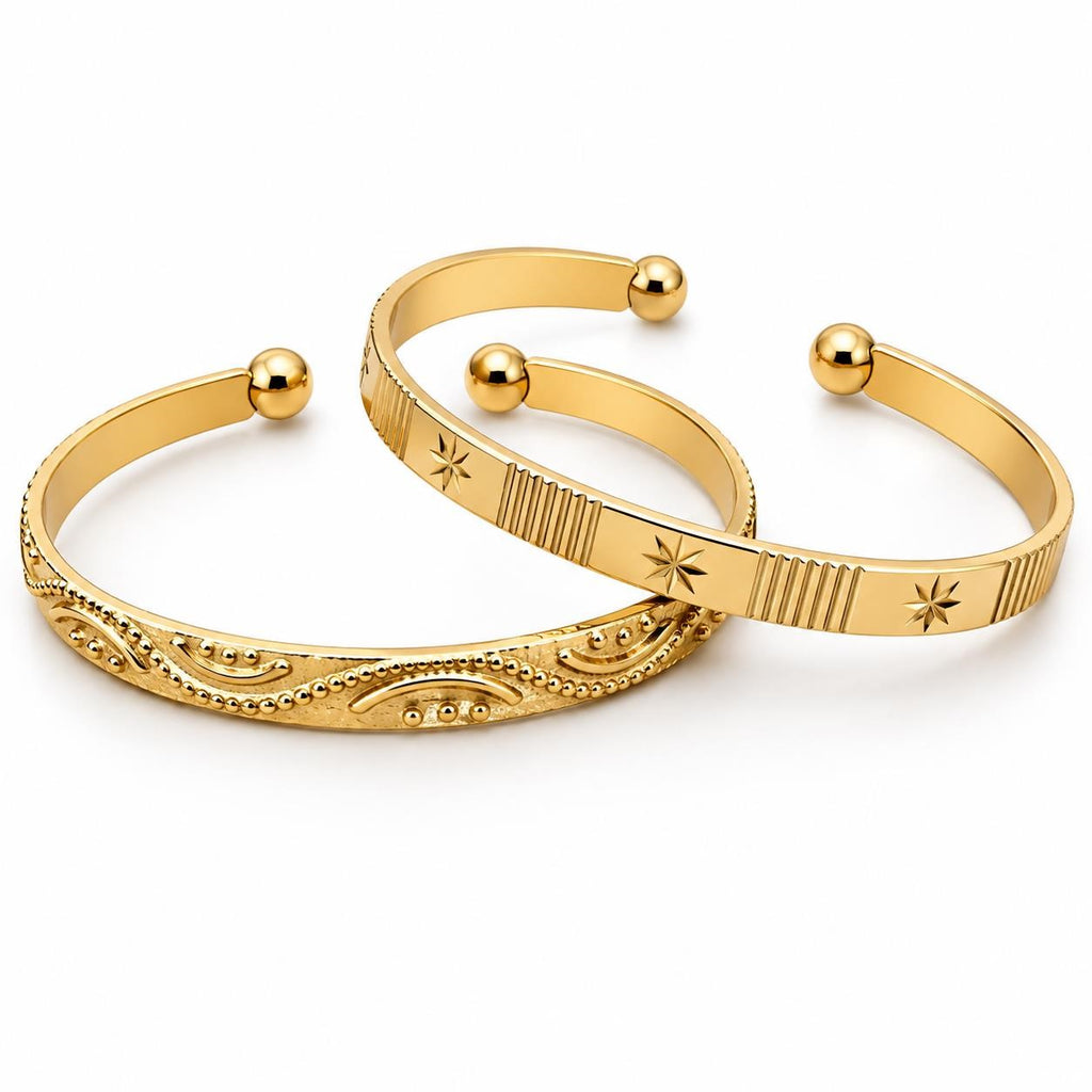Two gold tone bangle bracelets from Republic Mercantile, stacked and shiny, with smooth and textured finishes.
