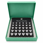 Pair of 12 heart-shaped rhinestone earrings by Republic Mercantile, sparkling jewelry with intricate design and shining stones.