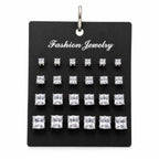 12 pairs of square rhinestone earrings by Republic Mercantile, showcasing sparkling jewelry with geometric design.