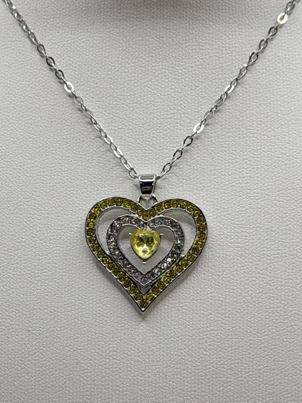 Yellow heart pendant necklace from Republic Mercantile featuring a gold-tone heart charm on a delicate chain.