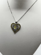 Yellow heart pendant necklace from Republic Mercantile featuring a gold-tone chain and a vibrant heart-shaped charm.