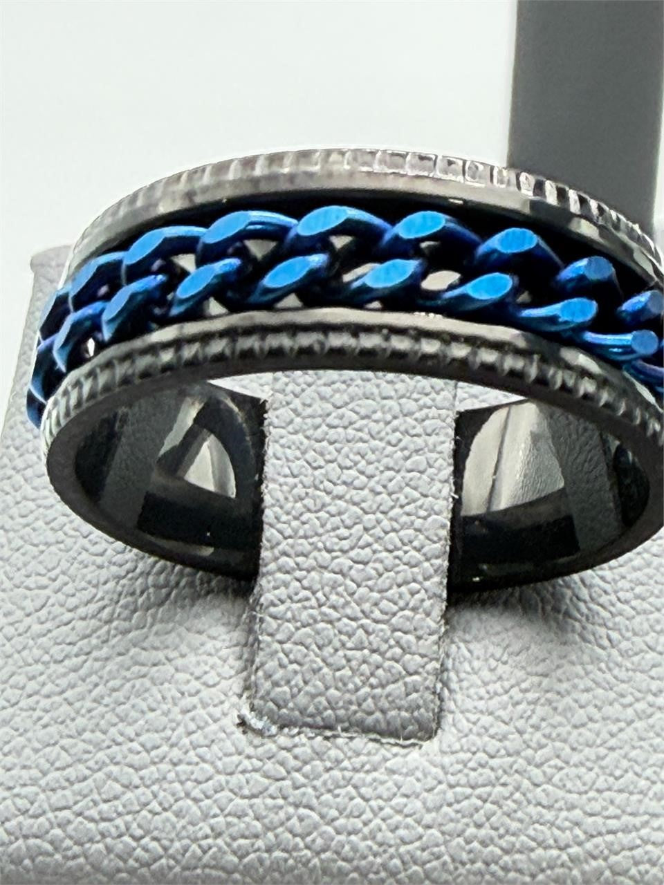 Men's blue chain-link ring on black band, size 10, from Republic Mercantile, showcasing a stylish modern jewelry design.