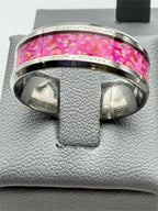 Women's pink and silver band ring by Republic Mercantile, size 11, featuring a shiny metallic finish and elegant design.