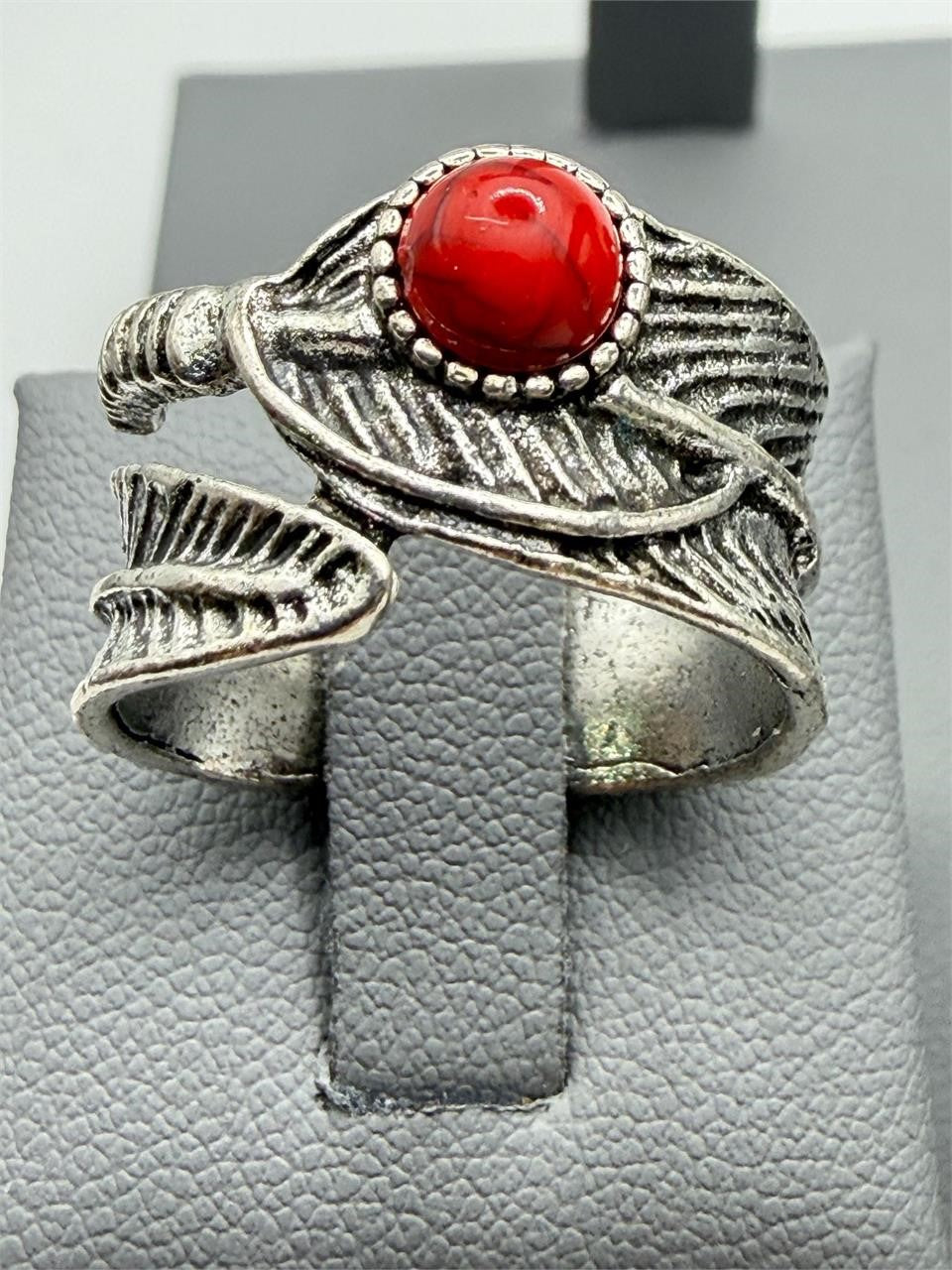 Silver tone wide ring with a red agate gemstone, size 7, from Republic Mercantile featuring a lustrous finish.