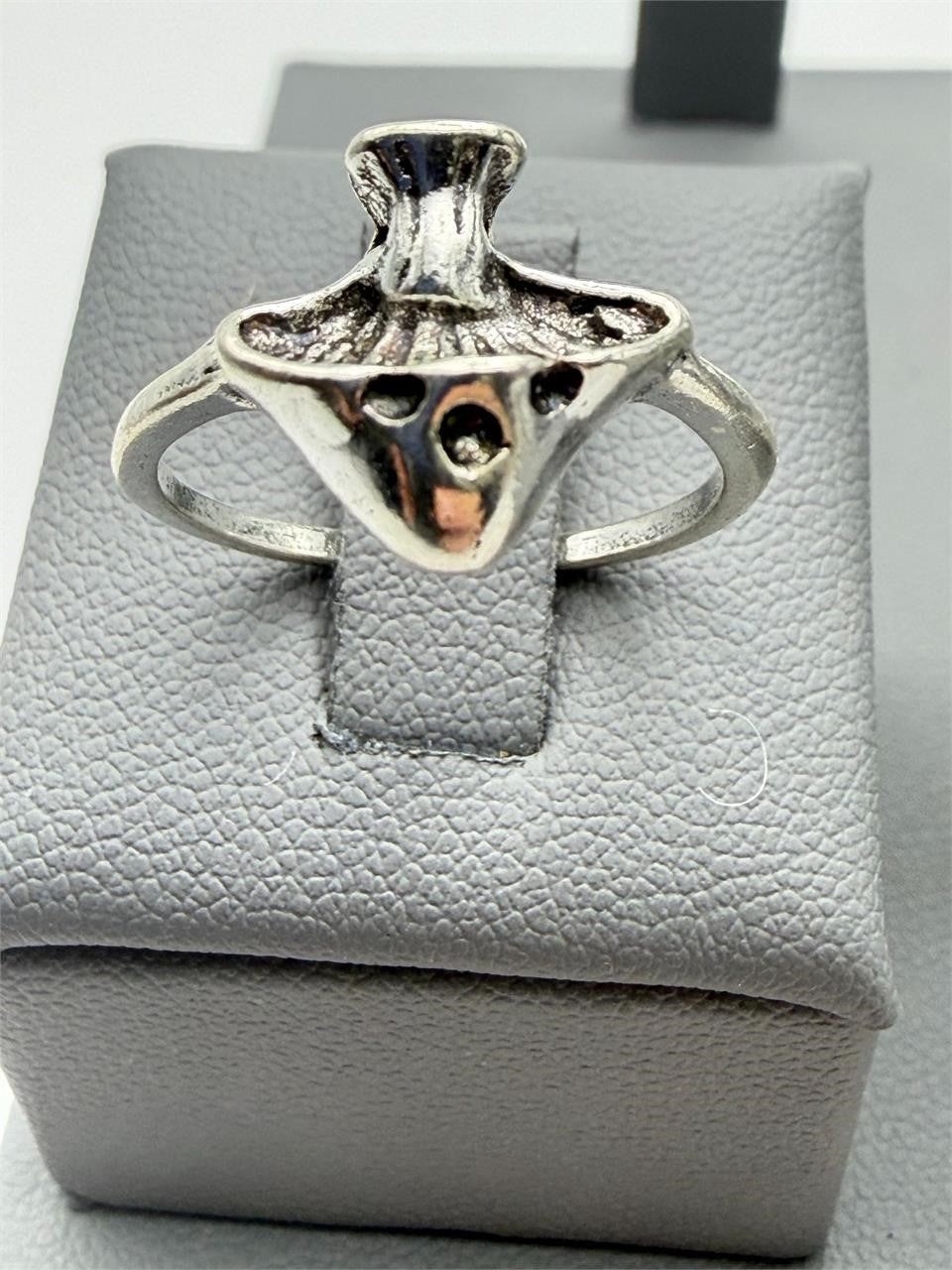 Silver toned Gothic ring in size 7 with intricate design, perfect for gothic jewelry enthusiasts, by Republic Mercantile.