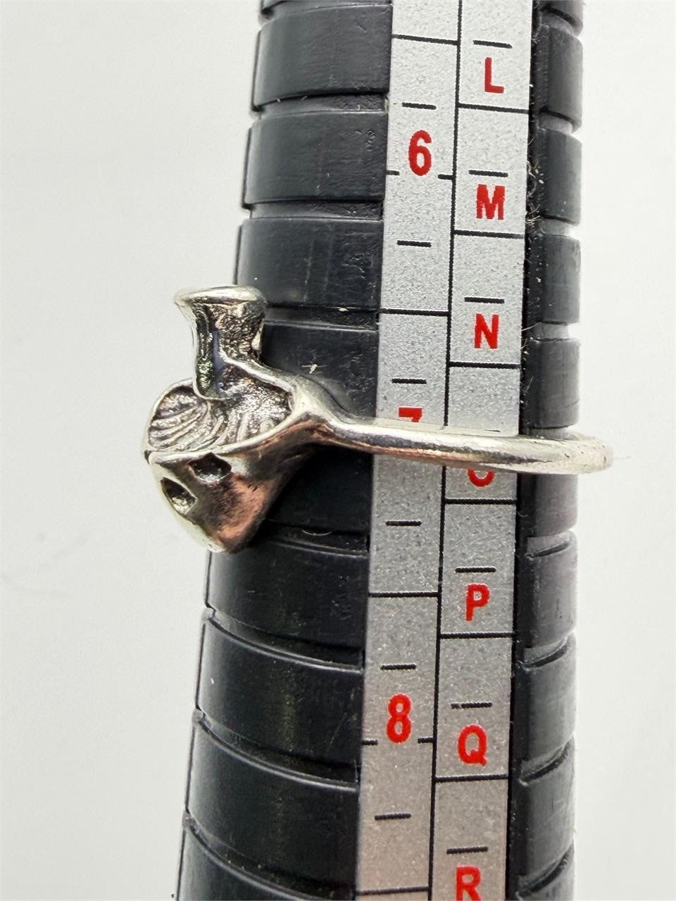 Silver toned Gothic ring in size 7 featuring intricate designs, perfect for gothic fashion and jewelry enthusiasts.