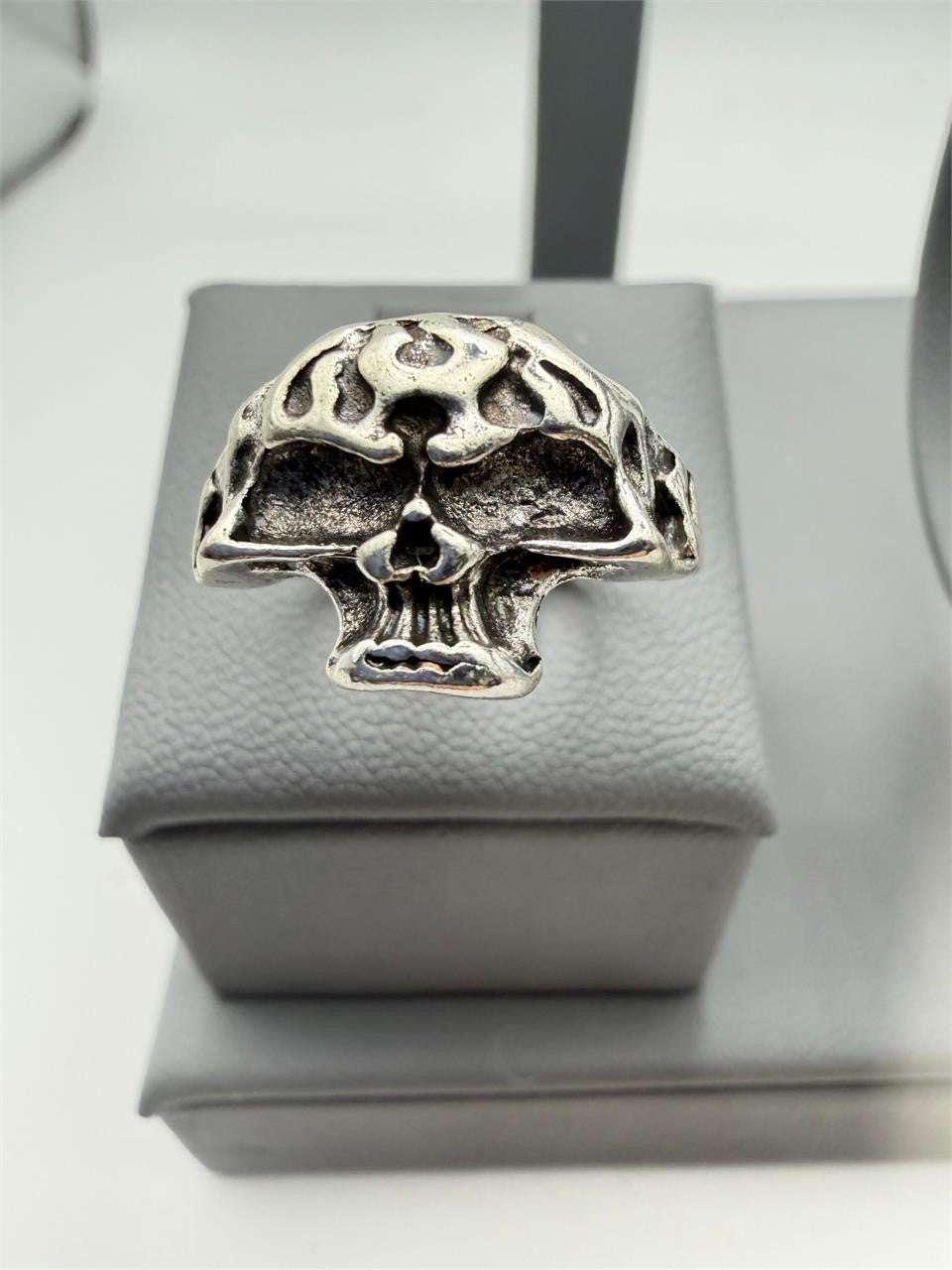 Silver toned skull ring in size 7 with detailed skull design, crafted by Republic Mercantile.