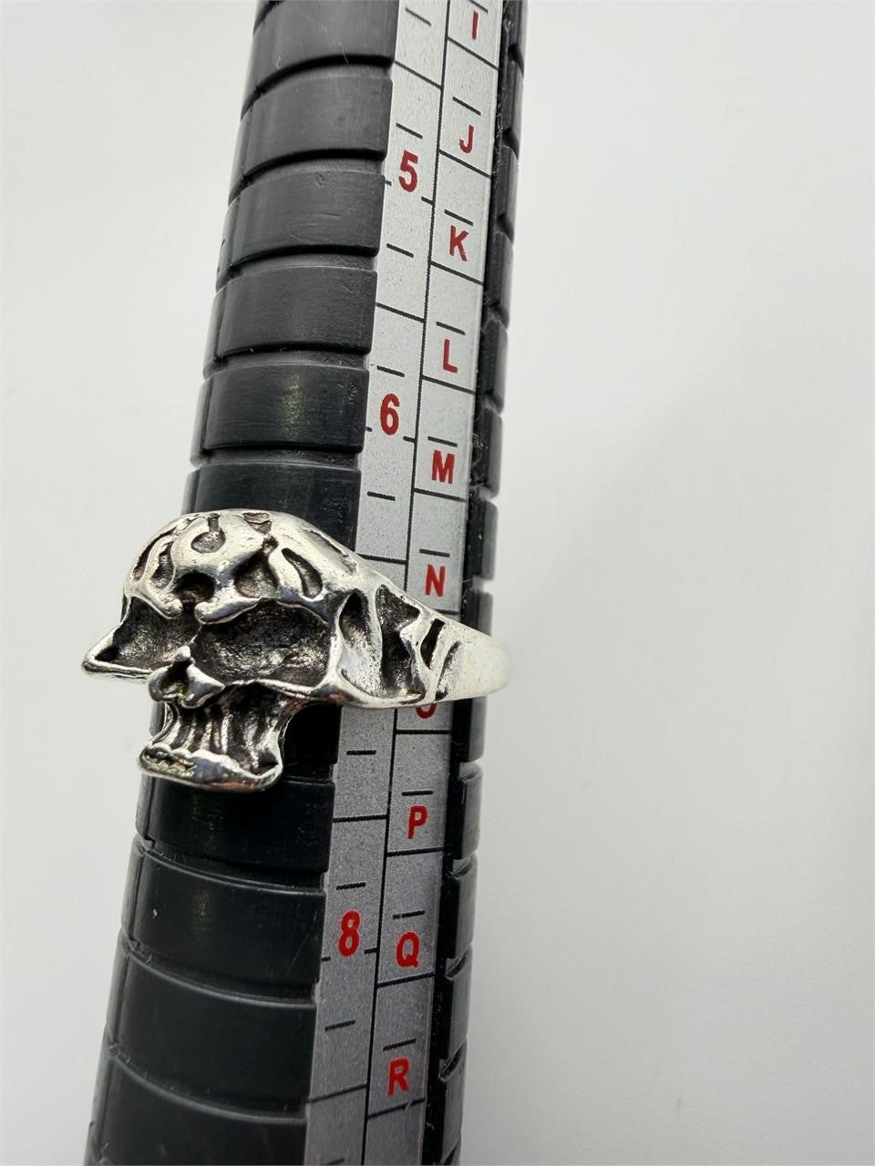 Silver toned skull ring in size 7 with detailed skull design, crafted by Republic Mercantile.