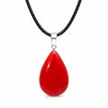 Red teardrop stone pendant necklace with rope chain from Republic Mercantile, showcasing a vibrant gemstone on a delicate chain.