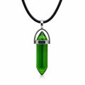Emerald green stone crystal point pendant necklace with silver chain, crafted by Republic Mercantile, close-up view of the pendant.