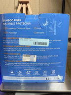 Bamboo waterproof Cali-King mattress protector by Republic Mercantile showing a fitted sheet style cover on a mattress.