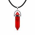 Red stone crystal point pendant necklace featuring a polished red stone crystal on a delicate chain.
