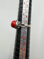 Sterling silver women's ring with red agate gemstone, size 7, featuring a polished band and vibrant red stone accent.