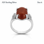 Sterling silver women's ring with copper goldstone gem, size 6, featuring a polished band and vibrant gemstone detail.