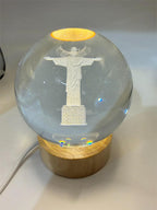 Laser etched crystal ball with LED stand featuring Christ design, Republic Mercantile product, clear glass with detailed engraving.