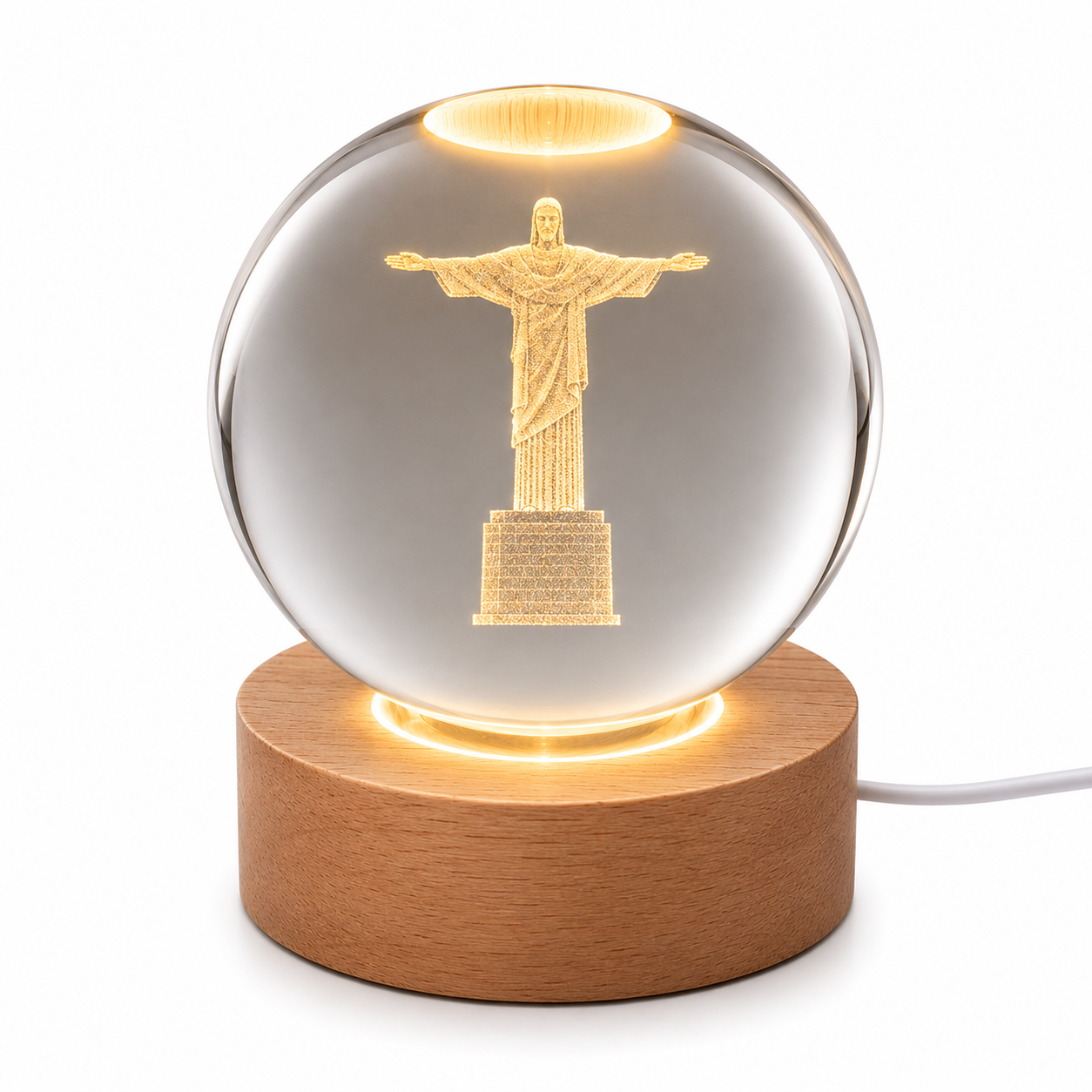 Laser etched crystal ball with LED stand featuring Christ design, crafted by Republic Mercantile, displayed on a black background.
