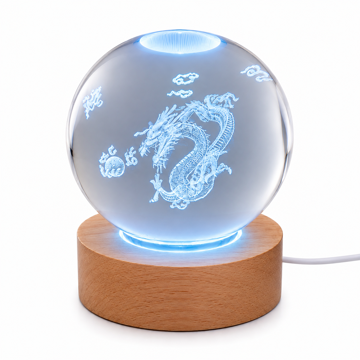 Laser etched crystal ball featuring a dragon design displayed on an LED stand, by Republic Mercantile.