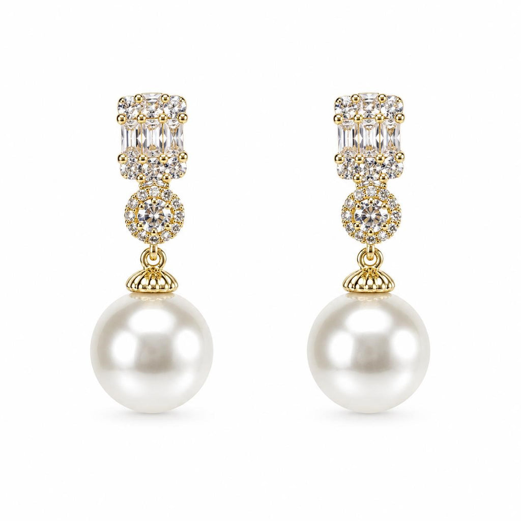Elegant pearl drop fashion earrings by Republic Mercantile, featuring lustrous pearls and delicate metal hooks for a sophisticated look.