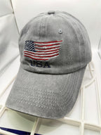 Light gray washed USA ball cap hat by Republic Mercantile, showing front view with adjustable strap and distressed fabric.