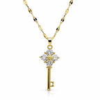 Gold tone crystal key pendant necklace with sparkling crystals and chain, stylish jewelry piece by Republic Mercantile.