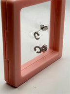 Silver plated letter "C" earrings by Republic Mercantile, featuring a sleek, minimalist design for stylish wear.